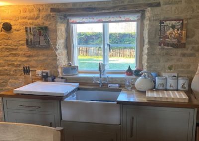 Kitchen with stone walls