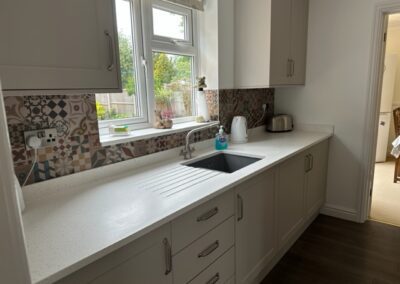 Compact Kitchen showcasing Minerva worktops